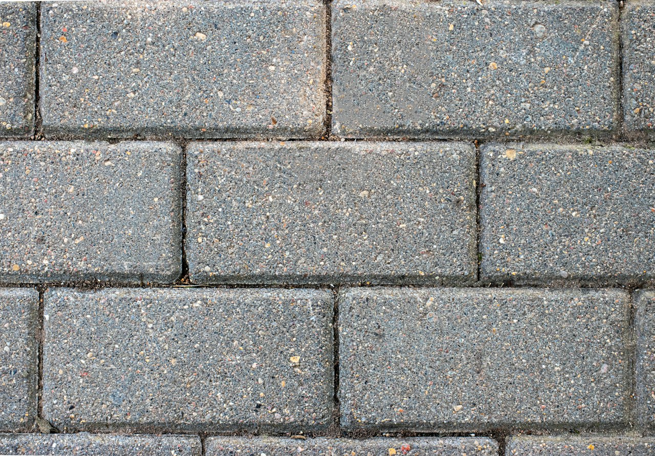 Grey concrete block paving close up