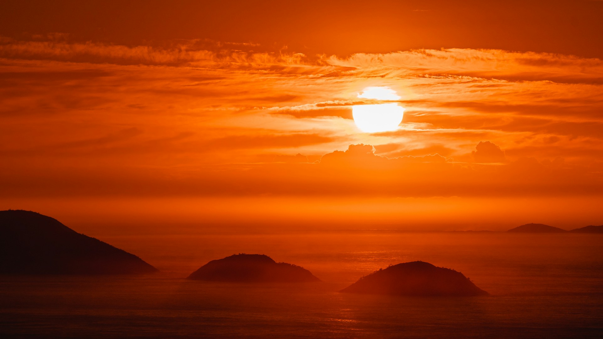 silhouette of mountains during sunset