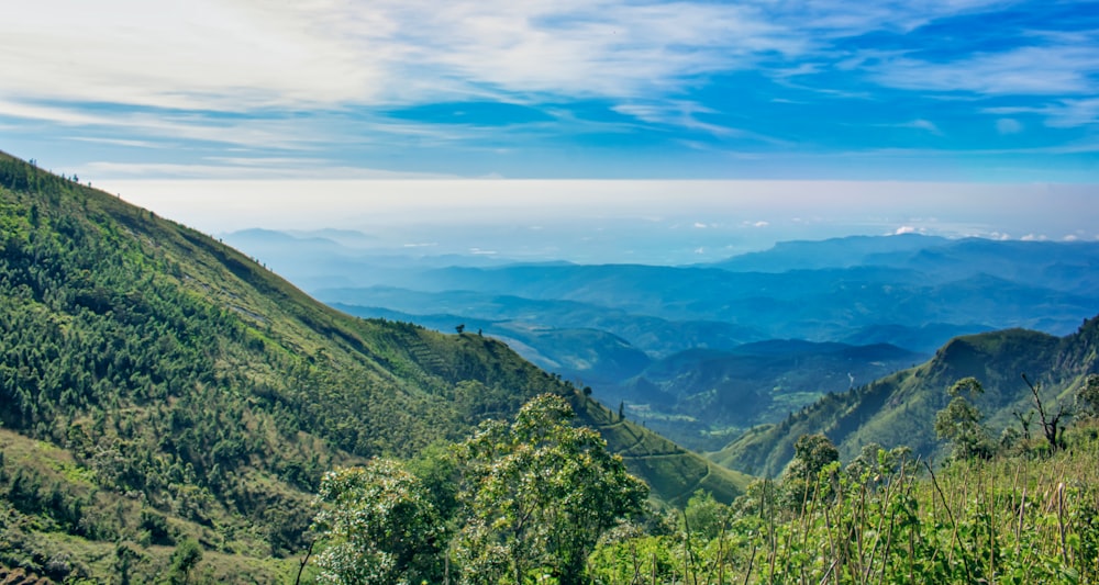 green mountains under blue sky during daytime