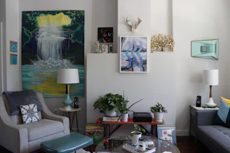 Cozy living room with a stylish decor kit including cushions, vases, and wall art