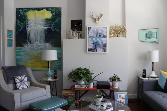 Cozy living room with a stylish decor kit including cushions, vases, and wall art