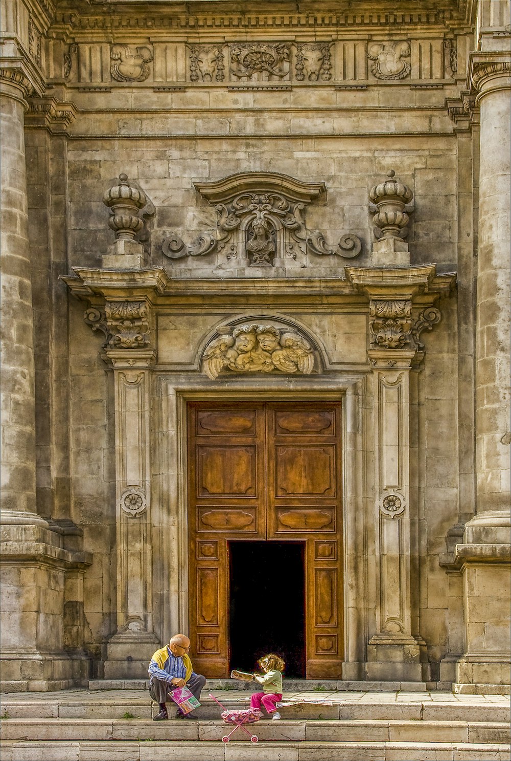 brown wooden door on gray concrete building