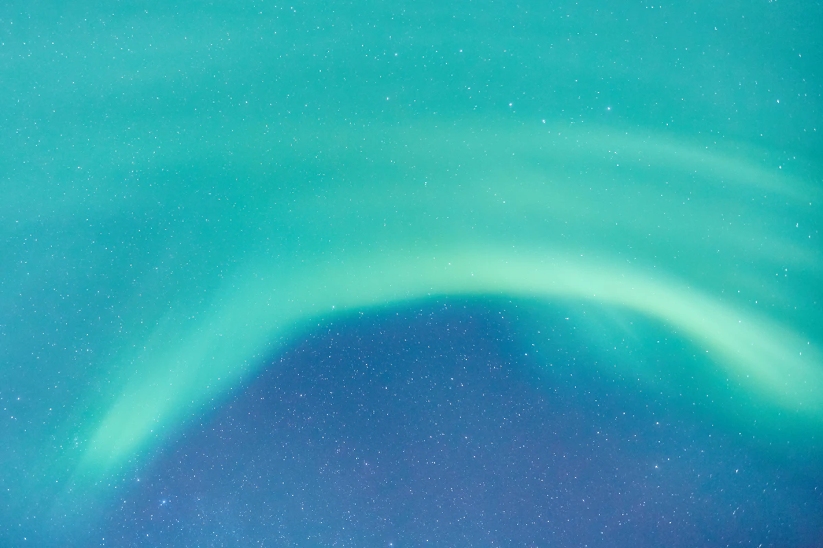 Green aurora waves in the sky