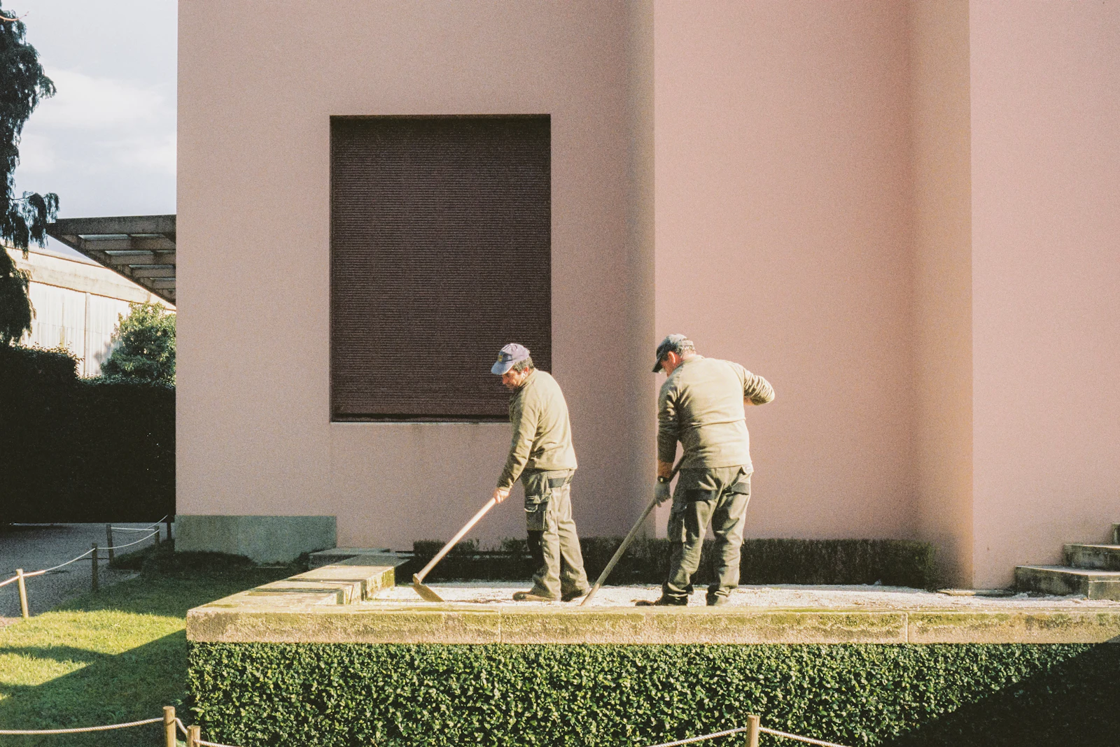 Landscaping crew working outdoors, representing lawn care and landscaping business health insurance