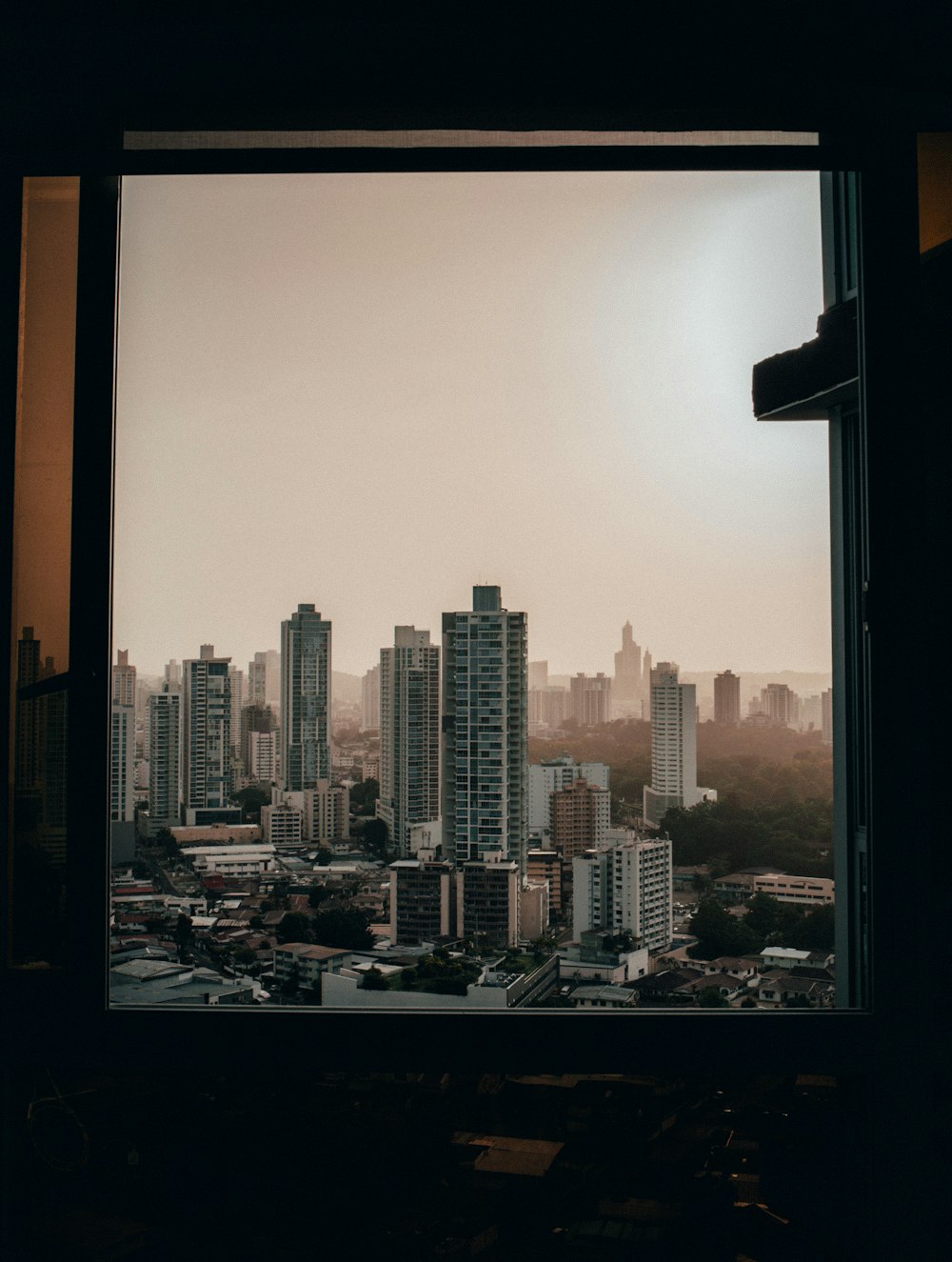 city skyline under white sky during daytime