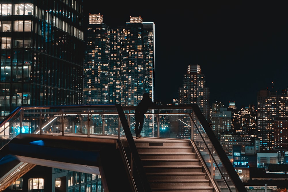 black and white concrete building during night time