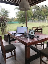 A peaceful outdoor workspace surrounded by nature.