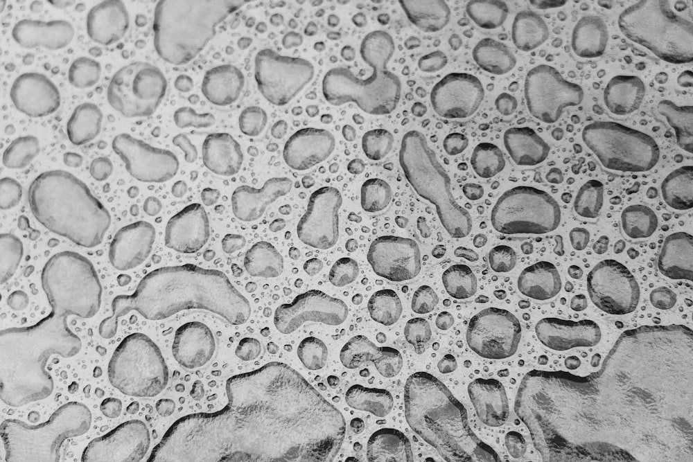 water droplets on gray surface