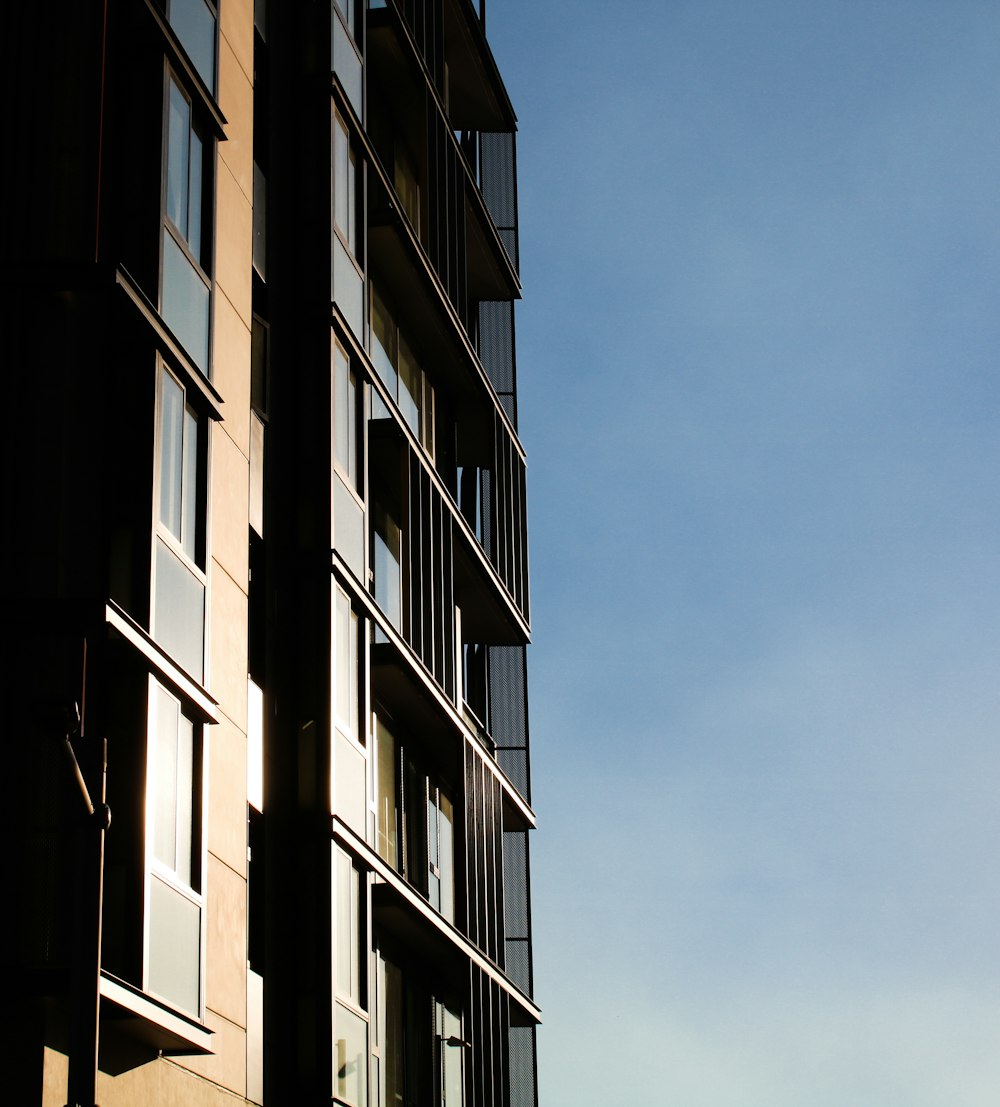 brown concrete building under blue sky during daytime