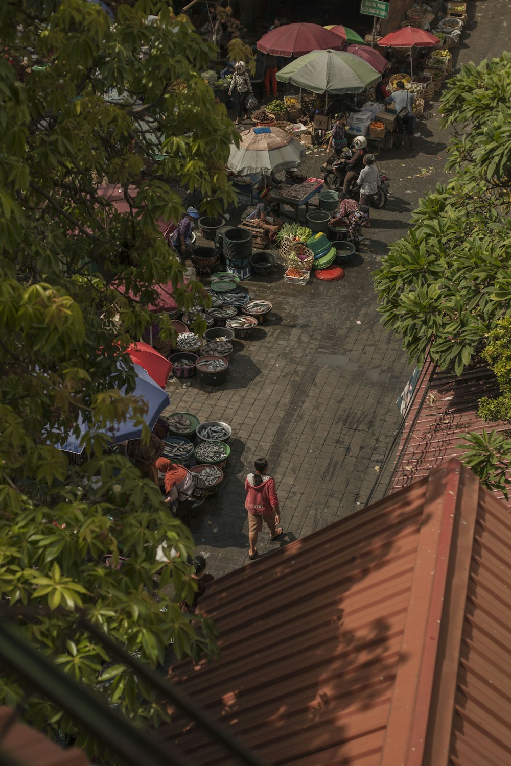 people walking on sidewalk during daytime