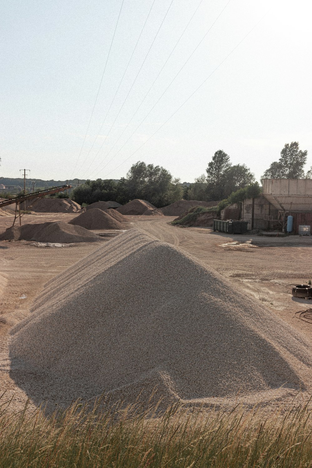 brown sand near brown concrete building during daytime