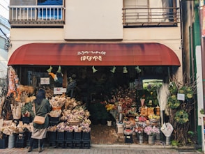people in front of store during daytime
