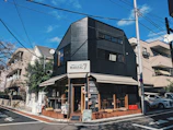 Street view of Necochea 722, the location of Black Agency, on a sunny day.