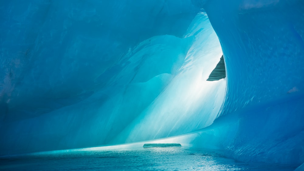 white and blue ice on water