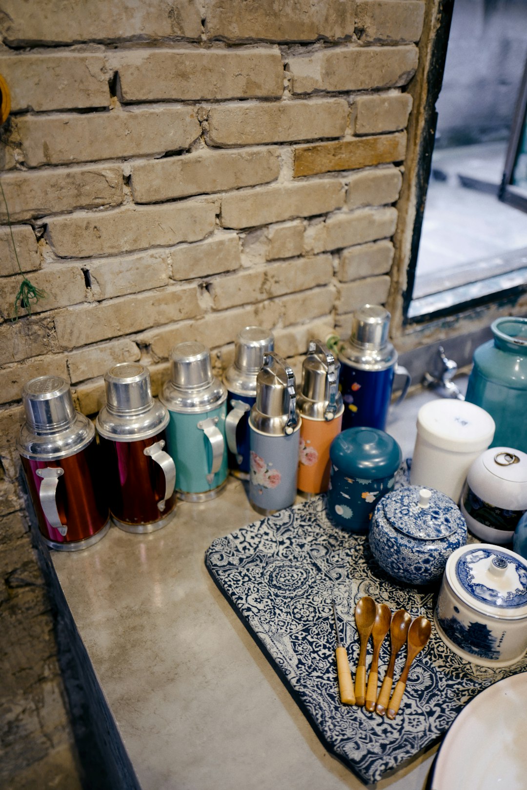 assorted bottles on gray table