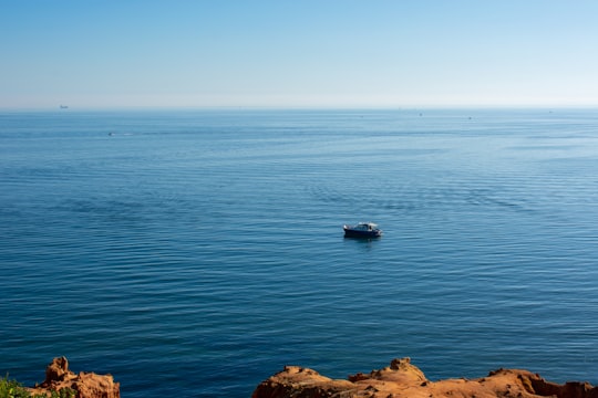 black boat on blue sea during daytime in Black Rock VIC Australia