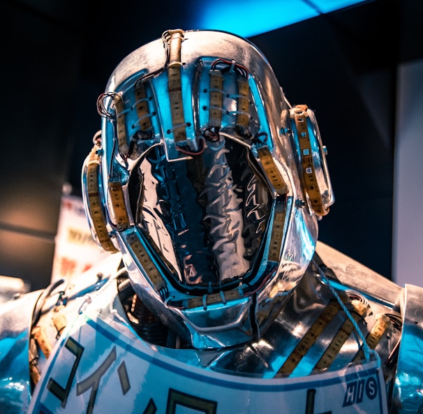 blue and black helmet on blue and white textile