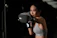 A focused athlete throwing punches in the sleek MMA training area at Fight Haus.