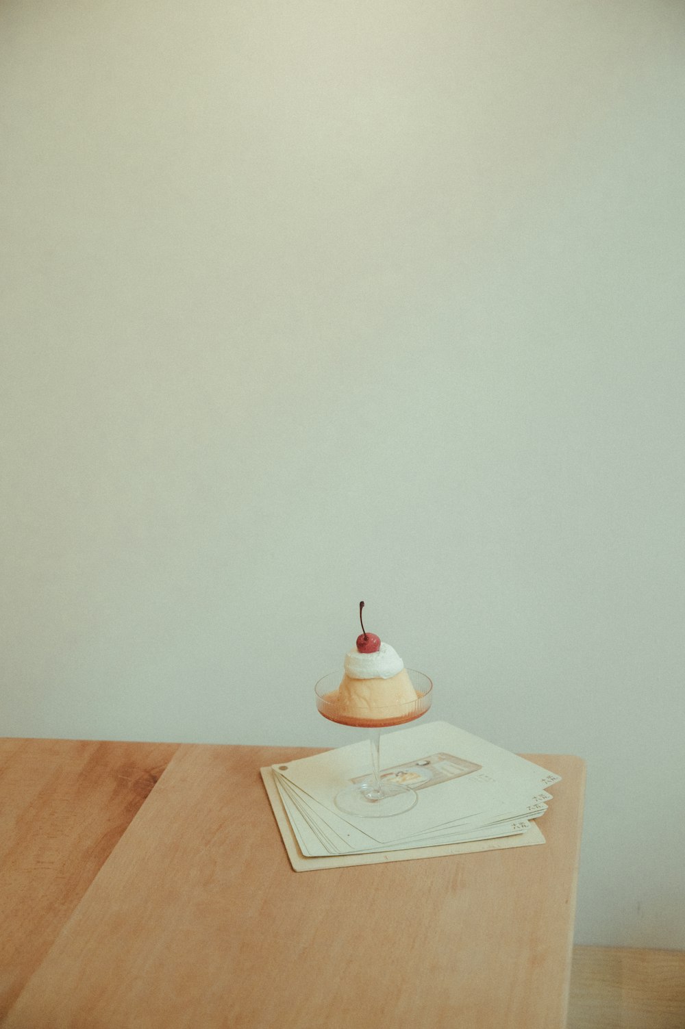 white and brown ceramic table decor on white paper