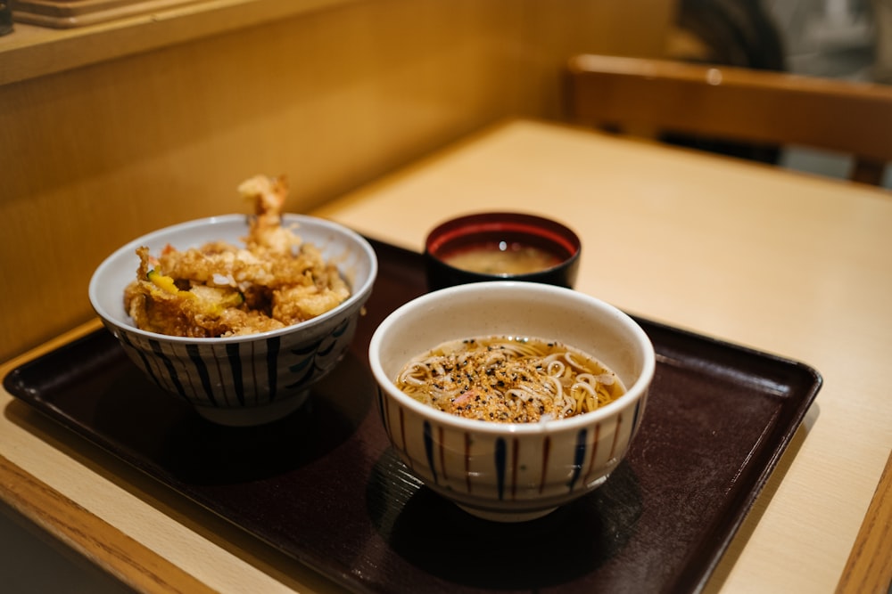 white ceramic bowl with brown soup