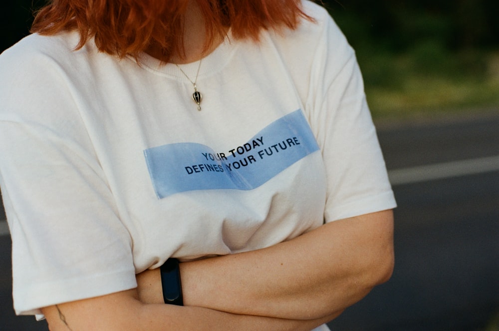 woman in white crew neck t-shirt