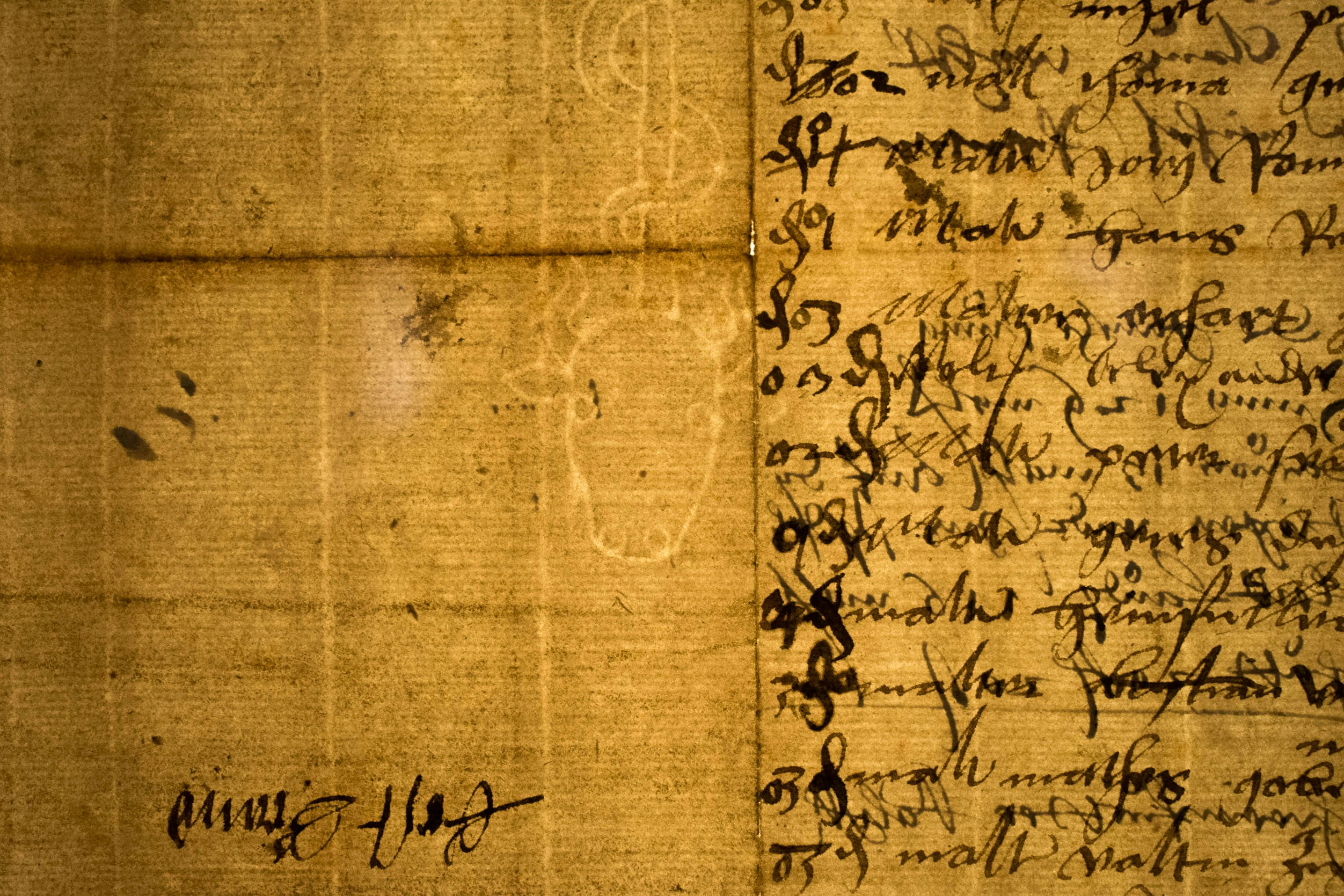 A close-up of paper pulp in a recycling facility, showing the repulping process.