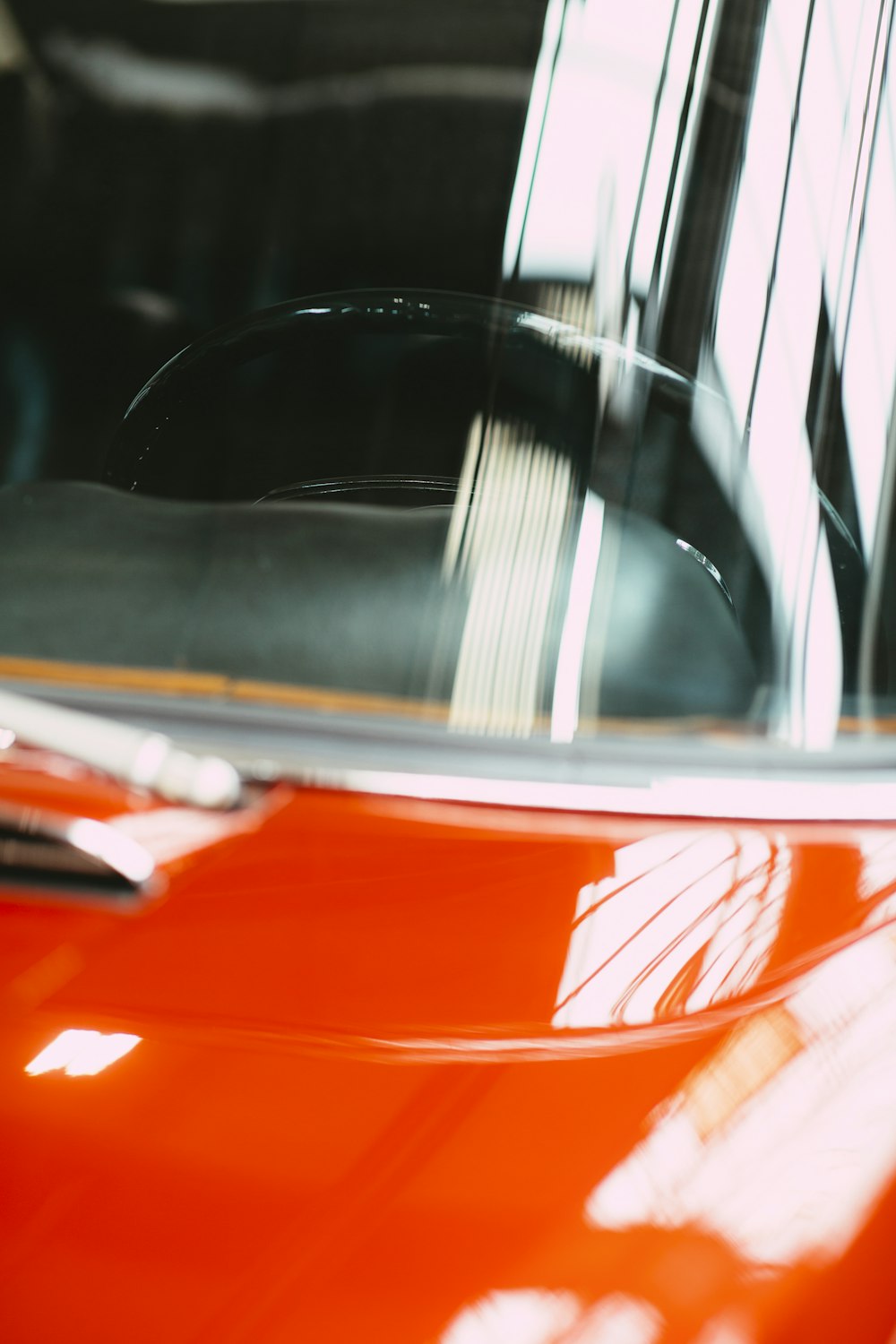 red car with white and black door