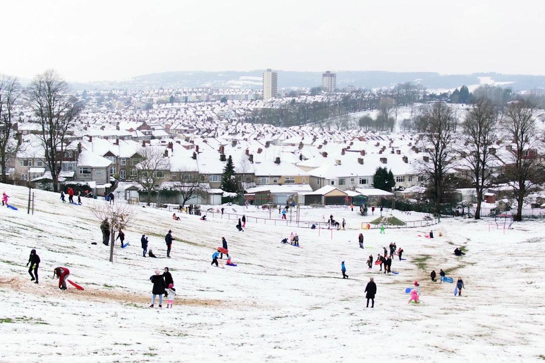 Snow in Bristol and kids playing in a park with city view – Bristol digital marketing - Photo by Ruben Gregori | best digital marketing - London, Bristol and Bath marketing agency