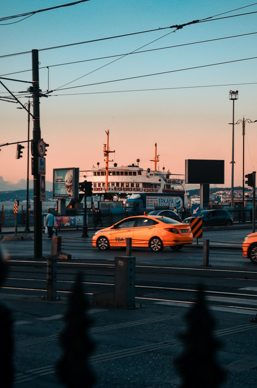 yellow sedan on road during daytime