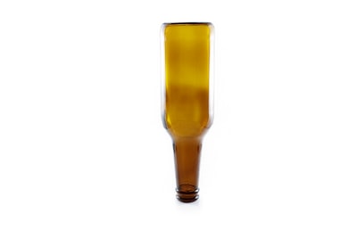 clear drinking glass with brown liquid glass teams background