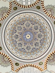 white brown and blue floral round decor