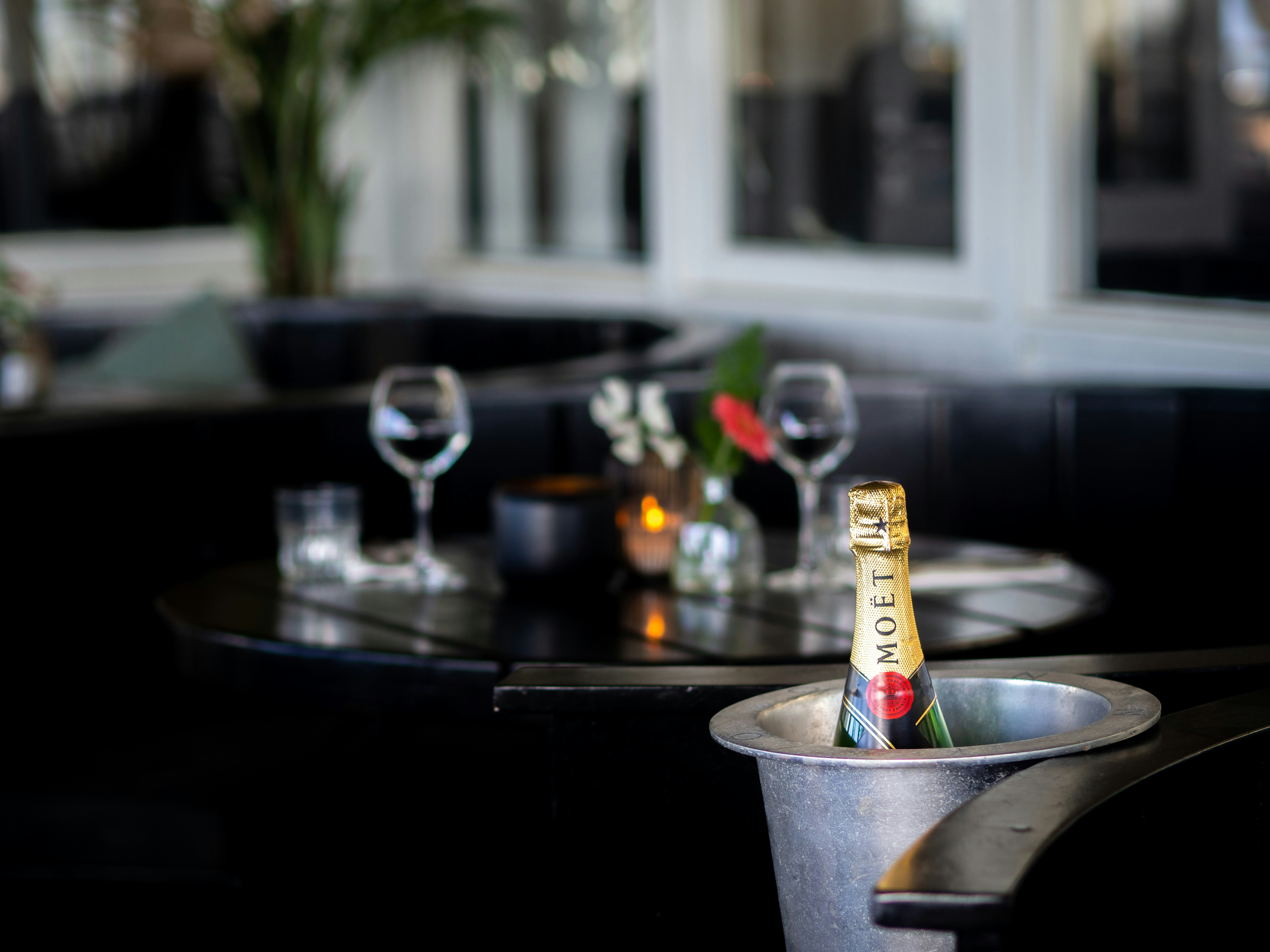 yellow and white labeled soft tube on black table