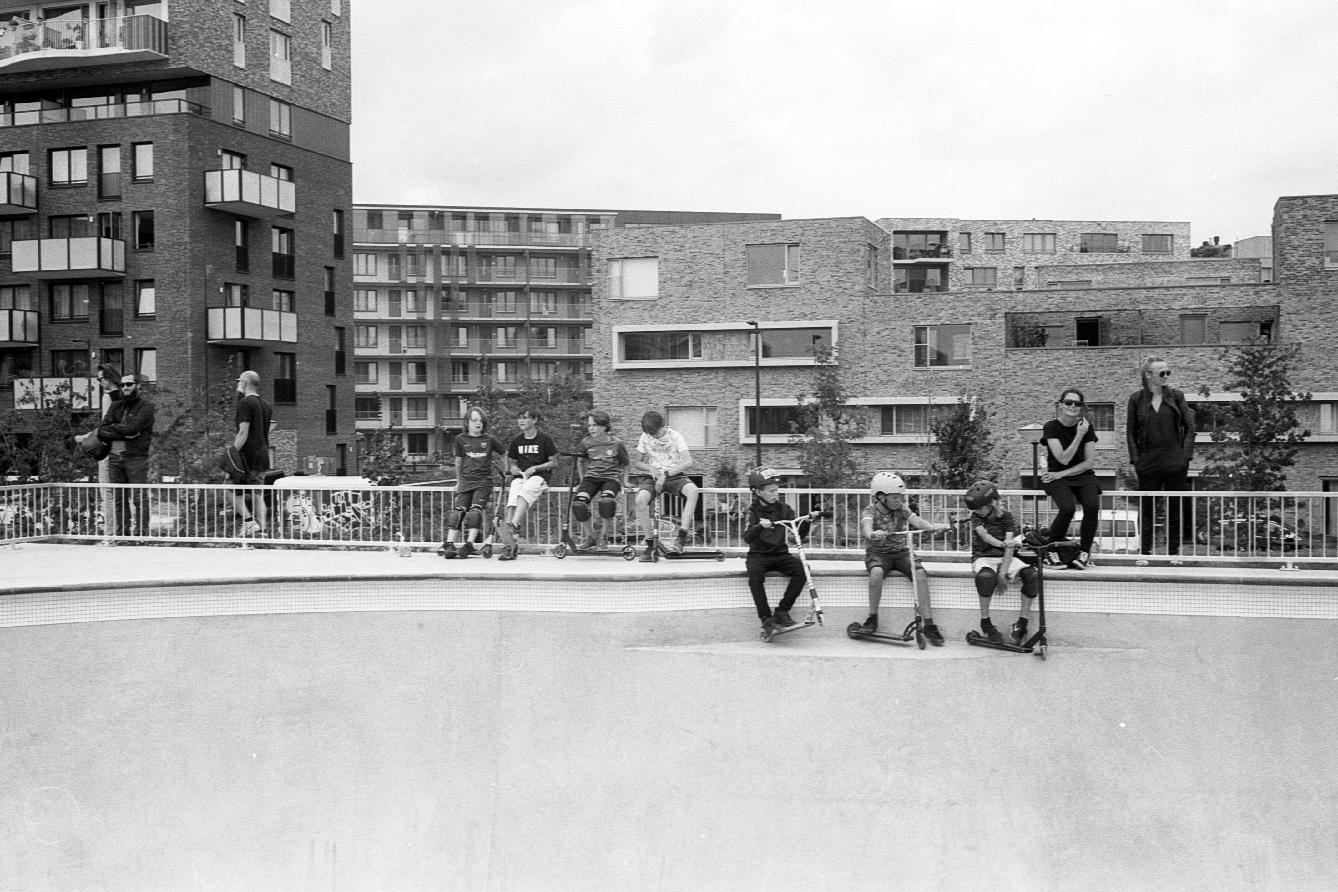 grayscale photo of people walking on street