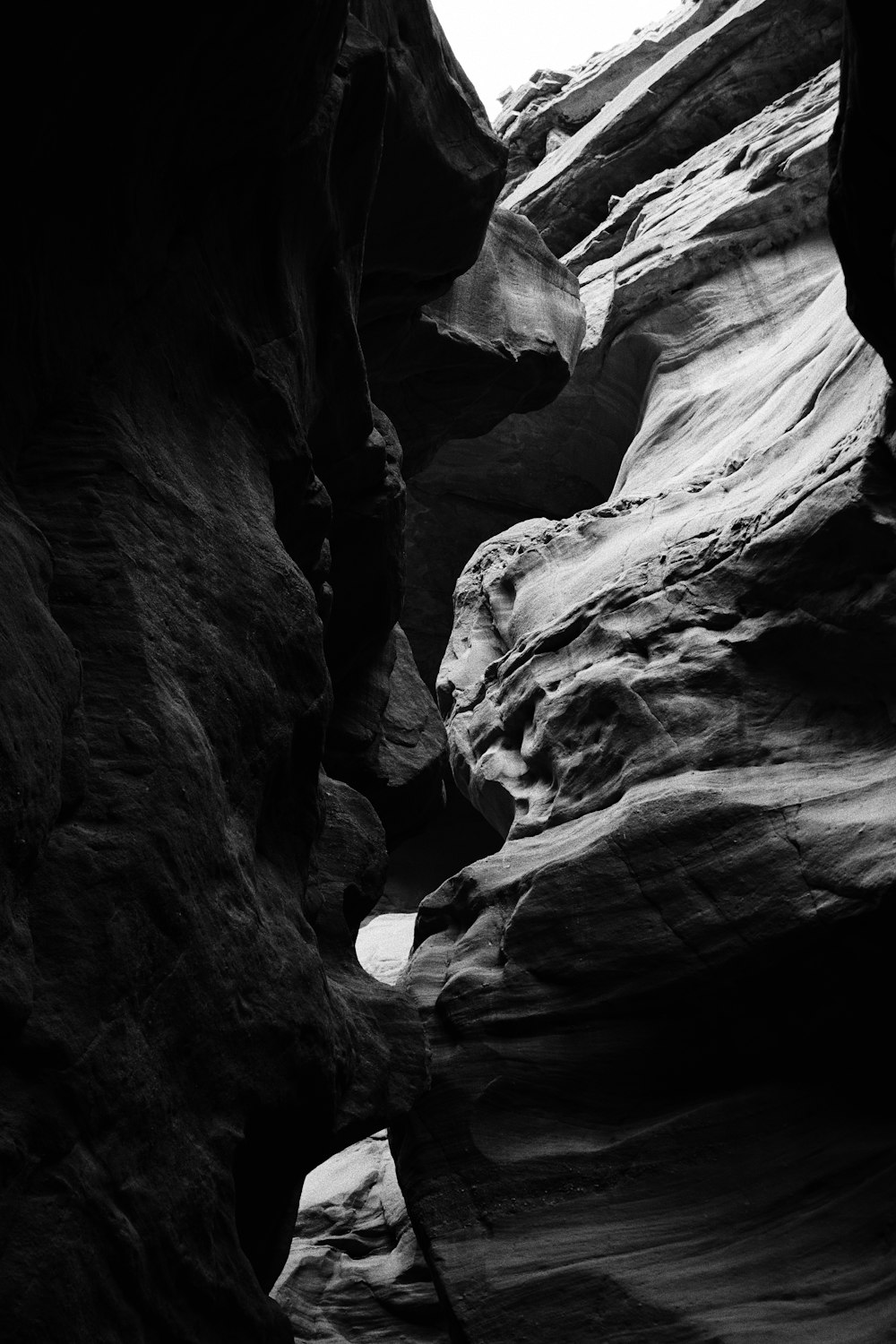 grayscale photo of rock formation