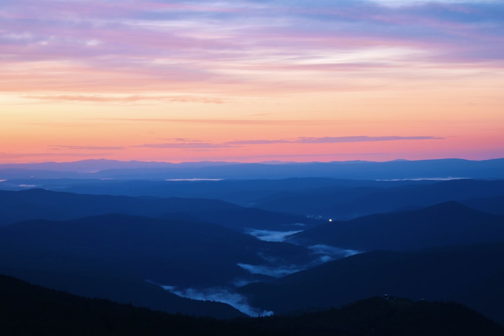 aerial view of mountains during sunset