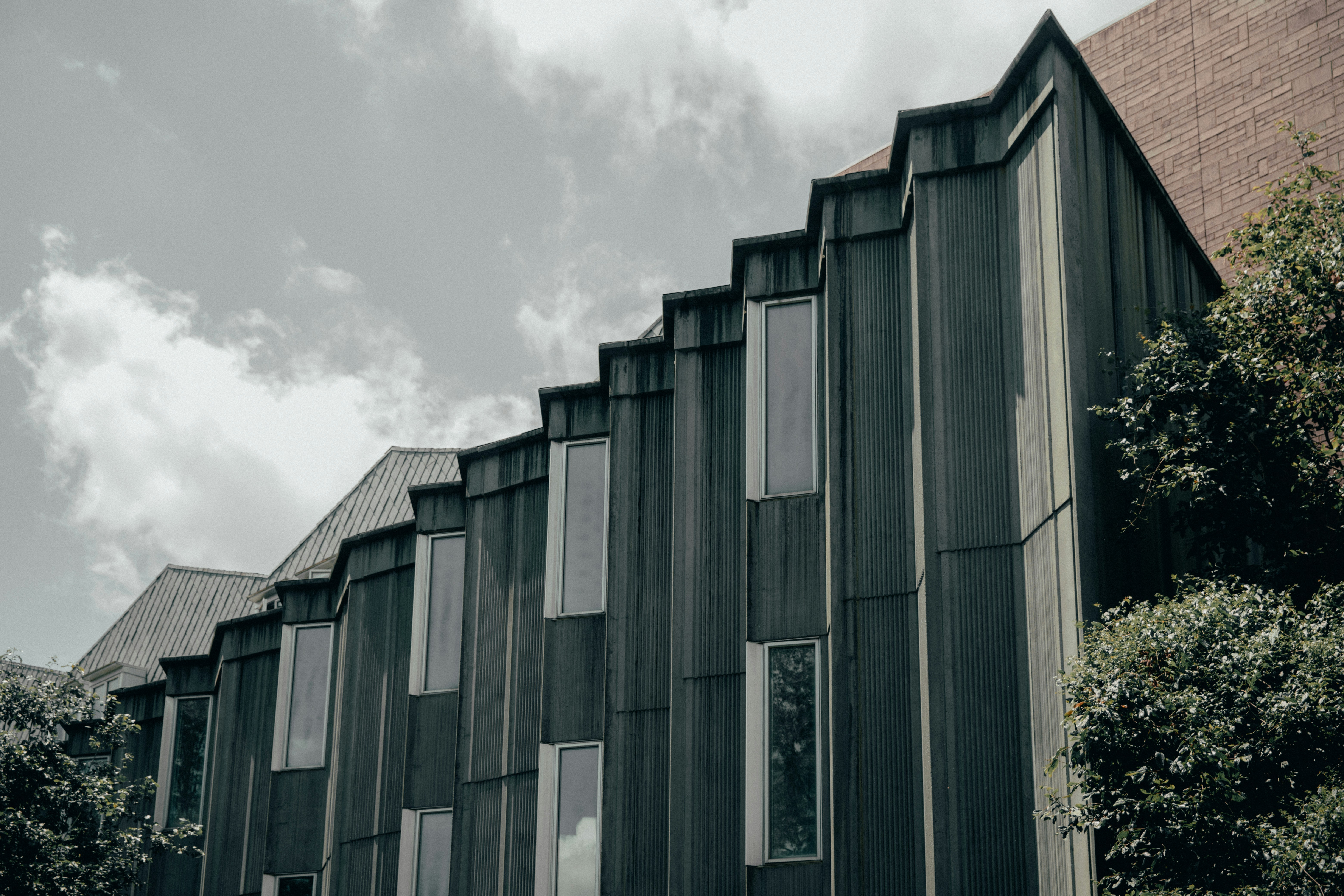 Brown and gray concrete luxury campus building