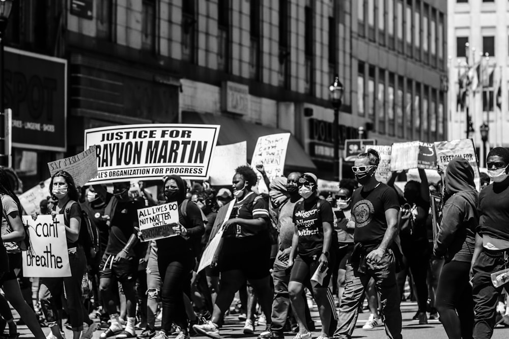 grayscale photo of people on street