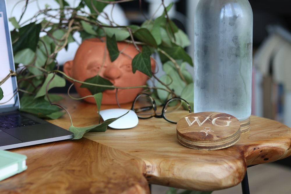 white apple magic mouse on brown wooden table