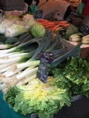 A vibrant market stall filled with fresh, colorful vegetables.