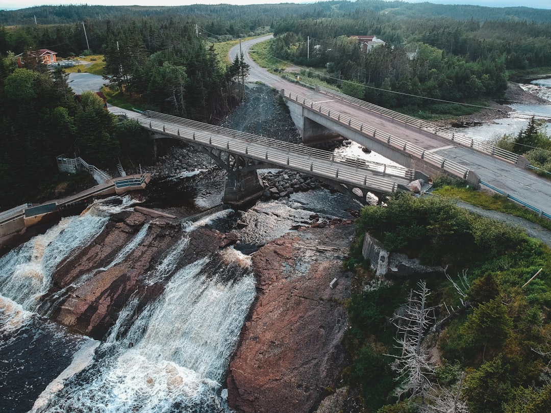 white bridge over river during daytime