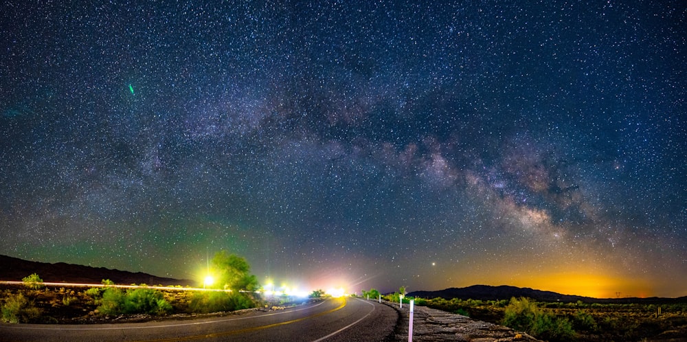 empty road under starry night