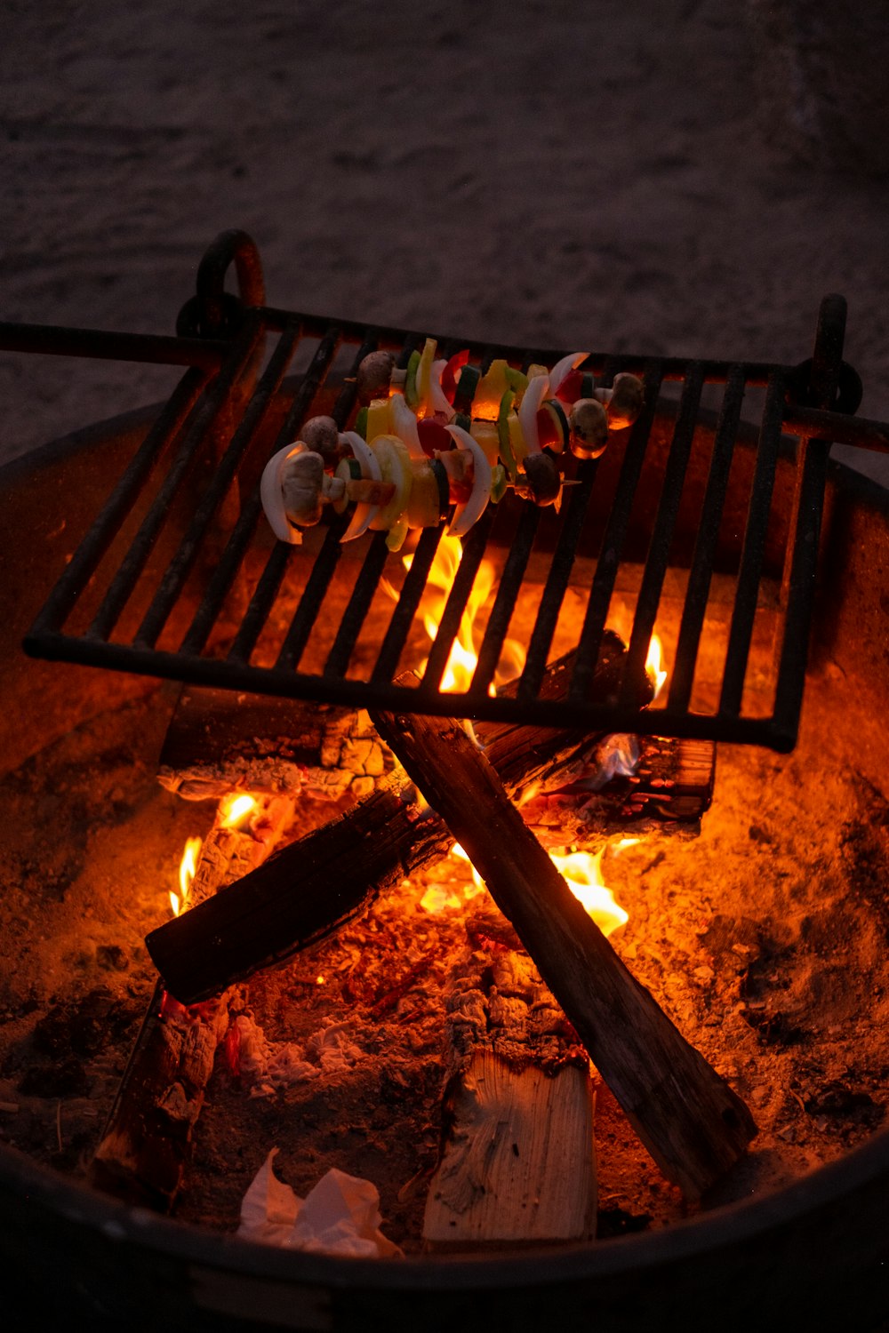 brown wooden bench with fire