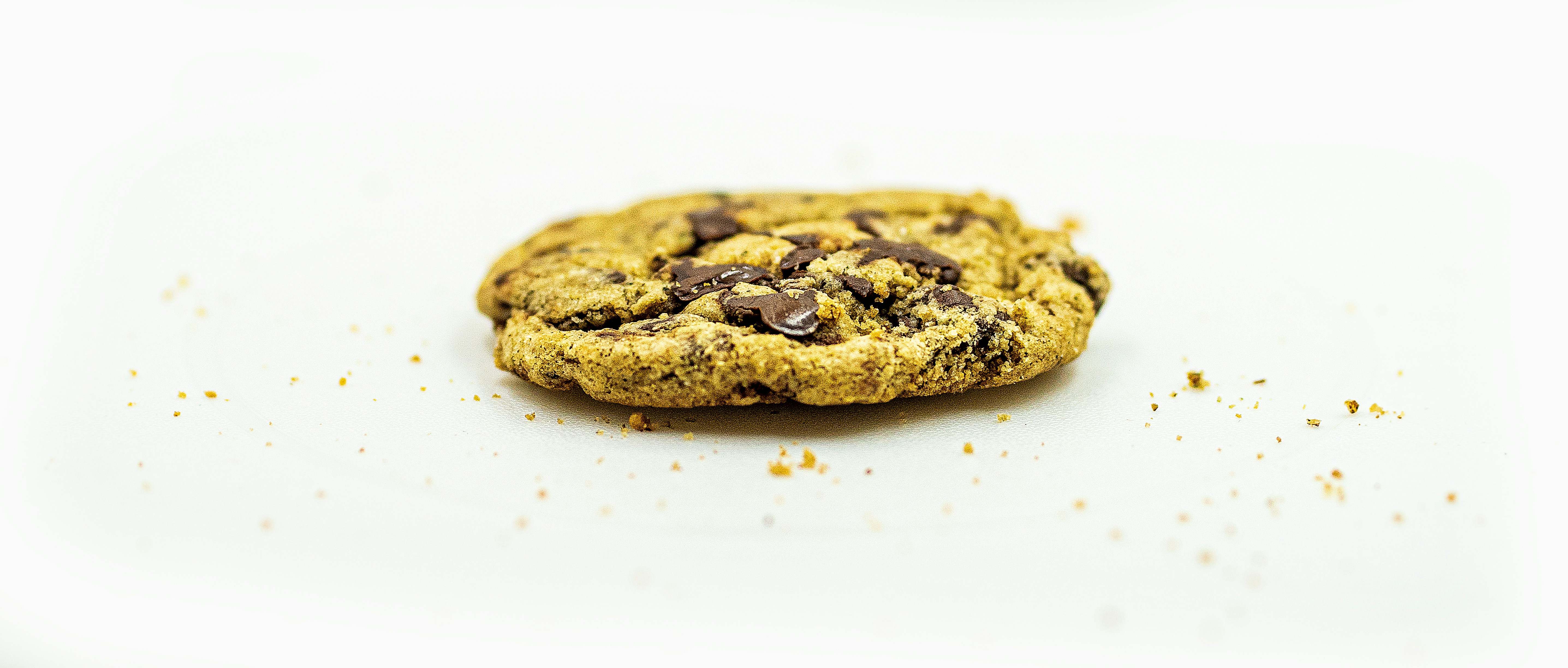 brown cookie on white surface cookie zoom background