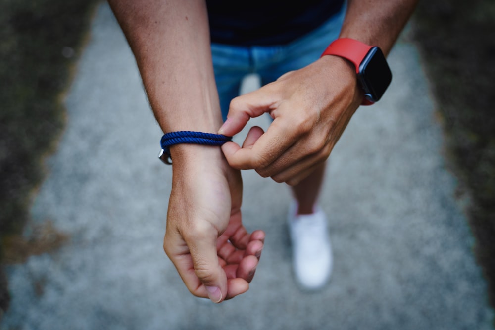 man and woman holding hands