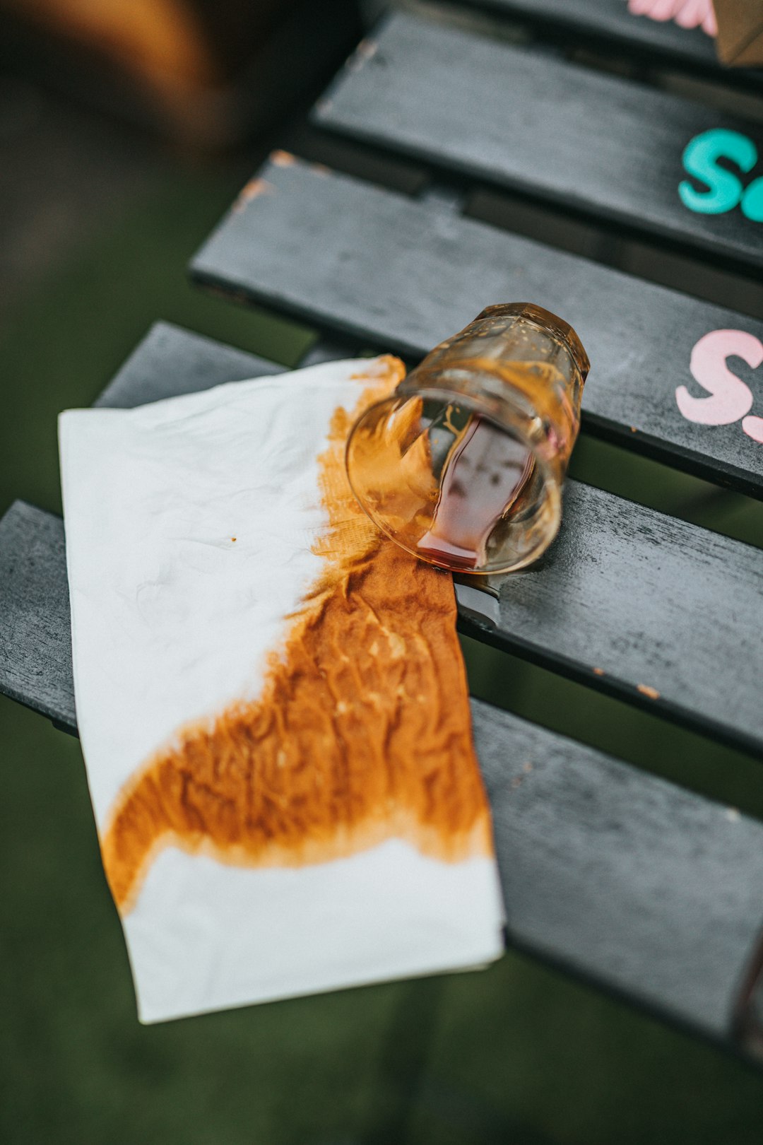 orange and white textile on black wooden table