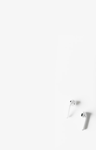 silver steel faucet on white surface