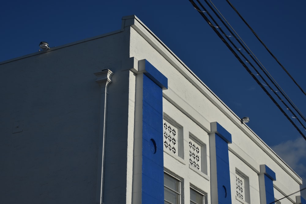 white concrete building under blue sky during daytime