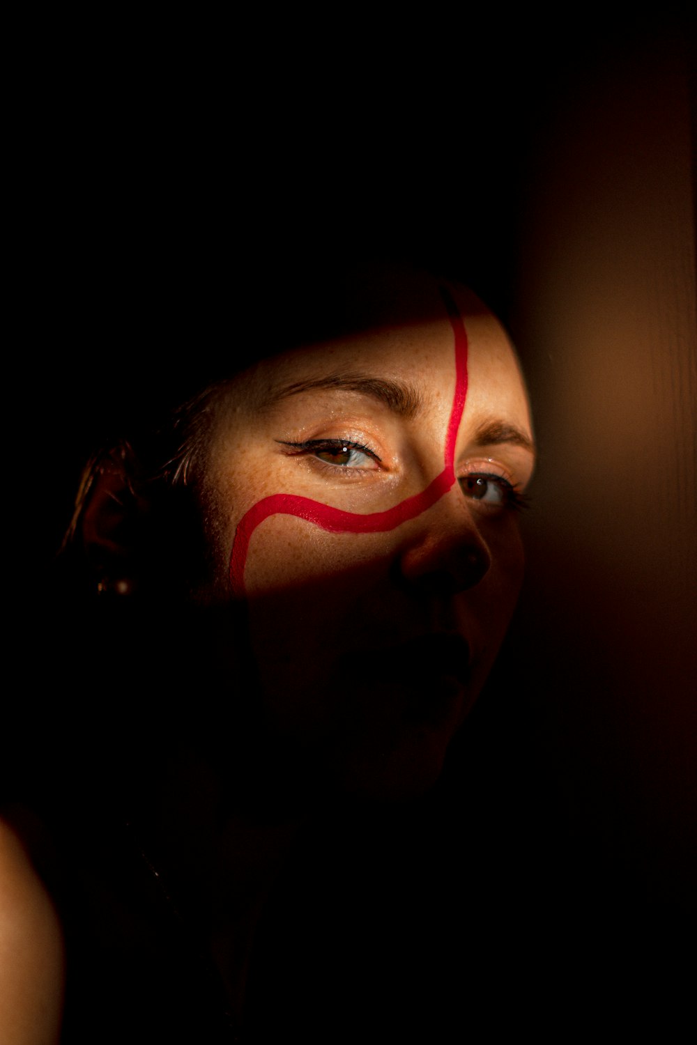 woman with red eyes with blue eyes