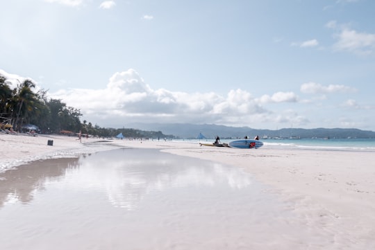 people on beach during daytime in Boracay Philippines