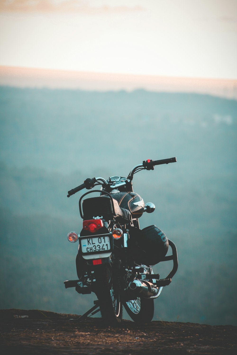 black motorcycle under gray sky